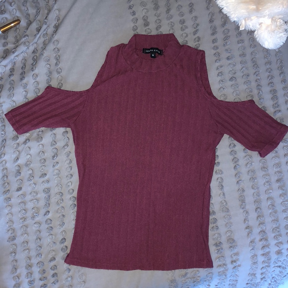 Shirt with holes in shoulders